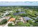 Luxury community with lake, mature trees and custom homes at 4431 Camino Real, Sarasota, FL 34231