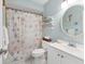 Coastal themed bathroom with decorative shower curtain and a vanity area at 4607 Mangrove Point Rd, Bradenton, FL 34210