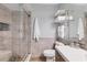 Beautiful bathroom featuring a glass shower with decorative tile work and a modern vanity at 4607 Mangrove Point Rd, Bradenton, FL 34210