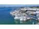 Boats docked at harbor with a view of the bridge and the town in the distance at 4607 Mangrove Point Rd, Bradenton, FL 34210