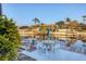 Outdoor dining area on the waterfront, perfect for entertaining and enjoying scenic views at 4607 Mangrove Point Rd, Bradenton, FL 34210