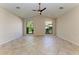 Empty bedroom with high ceilings and abundant natural light creates a serene and inviting atmosphere at 4749 Antler Trl, Sarasota, FL 34238