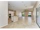 Open-concept living area connects the kitchen with lots of floor space and natural light at 4749 Antler Trl, Sarasota, FL 34238