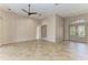 Bright living room with tile flooring and a double door front entrance at 4749 Antler Trl, Sarasota, FL 34238