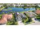 Aerial view of a luxury home community with lake access at 4921 Woodhurst Dr, Sarasota, FL 34243