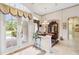 Elegant dining room with chandelier and hardwood floors at 4921 Woodhurst Dr, Sarasota, FL 34243