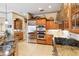 Kitchen with stainless steel appliances and granite countertops at 4921 Woodhurst Dr, Sarasota, FL 34243