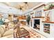 Living room with hardwood floors and view of kitchen at 4921 Woodhurst Dr, Sarasota, FL 34243