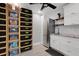 Basement kitchenette with stainless steel appliances and white cabinets at 512 Whitfield Ave, Sarasota, FL 34243