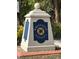 Whitfield Estates neighborhood sign, stone pillar with the neighborhood's name and emblem at 512 Whitfield Ave, Sarasota, FL 34243