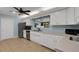 Clean and bright kitchen with ample counter space at 512 Whitfield Ave, Sarasota, FL 34243