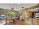 Cozy breakfast nook with table and chairs, overlooking the backyard at 5180 Meldon Cir, Sarasota, FL 34232