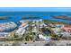 Aerial view of waterfront community with pool at 527 Sutton Pl # T-12, Longboat Key, FL 34228