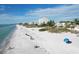 Beachfront property, aerial view showing beach and building at 527 Sutton Pl # T-12, Longboat Key, FL 34228