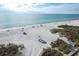 Drone view of beach with people relaxing at 527 Sutton Pl # T-12, Longboat Key, FL 34228