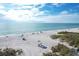 Beachfront property aerial view, showing beachgoers at 527 Sutton Pl # T-12, Longboat Key, FL 34228