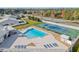 Aerial view of community pool and tennis courts at 5388 Pamela Wood Way # 8, Sarasota, FL 34233