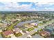 Aerial view of upscale community with golf course and lakefront homes at 5703 52Nd W Ave, Bradenton, FL 34210