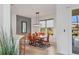 Dining room with modern light fixture and a view of backyard pool at 5703 52Nd W Ave, Bradenton, FL 34210