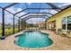 Stunning screened pool and spa overlooking a lake at 5703 52Nd W Ave, Bradenton, FL 34210