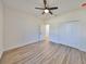 Bright bedroom with ceiling fan and large closet at 5923 22Nd Avenue E Dr, Palmetto, FL 34221