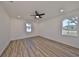 Bright bedroom with hardwood floors and two windows at 5923 22Nd Avenue E Dr, Palmetto, FL 34221