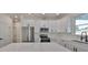 Modern kitchen with white cabinets and quartz countertops at 5923 22Nd Avenue E Dr, Palmetto, FL 34221