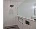 Large walk-in shower with marble-style tile and rain shower head at 5923 22Nd Avenue E Dr, Palmetto, FL 34221