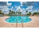 Beautiful, large community pool with a serene atmosphere, offering a perfect spot for relaxation and recreation at 6063 Benevento Dr, Sarasota, FL 34238