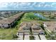 Community overview with golf course and lake views at 6086 Worsham Ln # 102, Bradenton, FL 34211