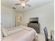 Spacious bedroom with large TV and built-in dresser at 6086 Worsham Ln # 102, Bradenton, FL 34211