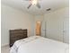 Bedroom with large dresser and view of bathroom at 6086 Worsham Ln # 102, Bradenton, FL 34211