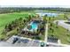 Community pool with lounge chairs and gazebo at 6086 Worsham Ln # 102, Bradenton, FL 34211