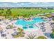 Large resort-style pool with waterfalls and plenty of lounge chairs at 6086 Worsham Ln # 102, Bradenton, FL 34211
