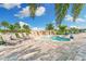 Relaxing spa pool with lounge chairs and a lift at 6086 Worsham Ln # 102, Bradenton, FL 34211