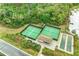 Two well-maintained tennis courts and bocce ball at 6086 Worsham Ln # 102, Bradenton, FL 34211