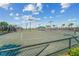 Well-maintained tennis courts with shade structures at 6086 Worsham Ln # 102, Bradenton, FL 34211