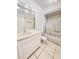 Bathroom with single vanity, tub/shower combo, and tiled floor at 613 Chevy Chase Dr, Sarasota, FL 34243