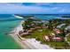 Aerial view of waterfront community near beach at 651 Fox St, Longboat Key, FL 34228