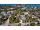 Aerial view of a single-story home with a metal roof, located in a residential neighborhood at 651 Fox St, Longboat Key, FL 34228