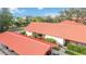 Aerial view of condo building showcasing red tile roofs at 6666 Draw Ln # 132, Sarasota, FL 34238