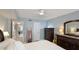 A well-lit bedroom with stylish furnishings and soft, neutral decor at 6939 W Country Club N Dr # 158, Sarasota, FL 34243