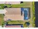 Bird's-eye view of home with pool, near lake at 6978 Superior Street Cir, Sarasota, FL 34243