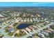 An expansive aerial view of a lakefront community at 6978 Superior Street Cir, Sarasota, FL 34243