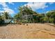 playground with swings and a slide at 6978 Superior Street Cir, Sarasota, FL 34243