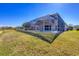 Screened pool and patio area with lake view at 6978 Superior Street Cir, Sarasota, FL 34243