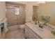 Bathroom with tub, sink, and vanity at 7003 9Th W Ave, Bradenton, FL 34209