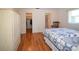 Comfortable bedroom with a double bed, ample closet space, and wood floors at 7003 9Th W Ave, Bradenton, FL 34209