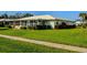 Single-story home with well-maintained lawn at 7003 9Th W Ave, Bradenton, FL 34209