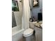 Bathroom with shower/tub, toilet and vanity at 7309 Royal Palm Dr, New Port Richey, FL 34652